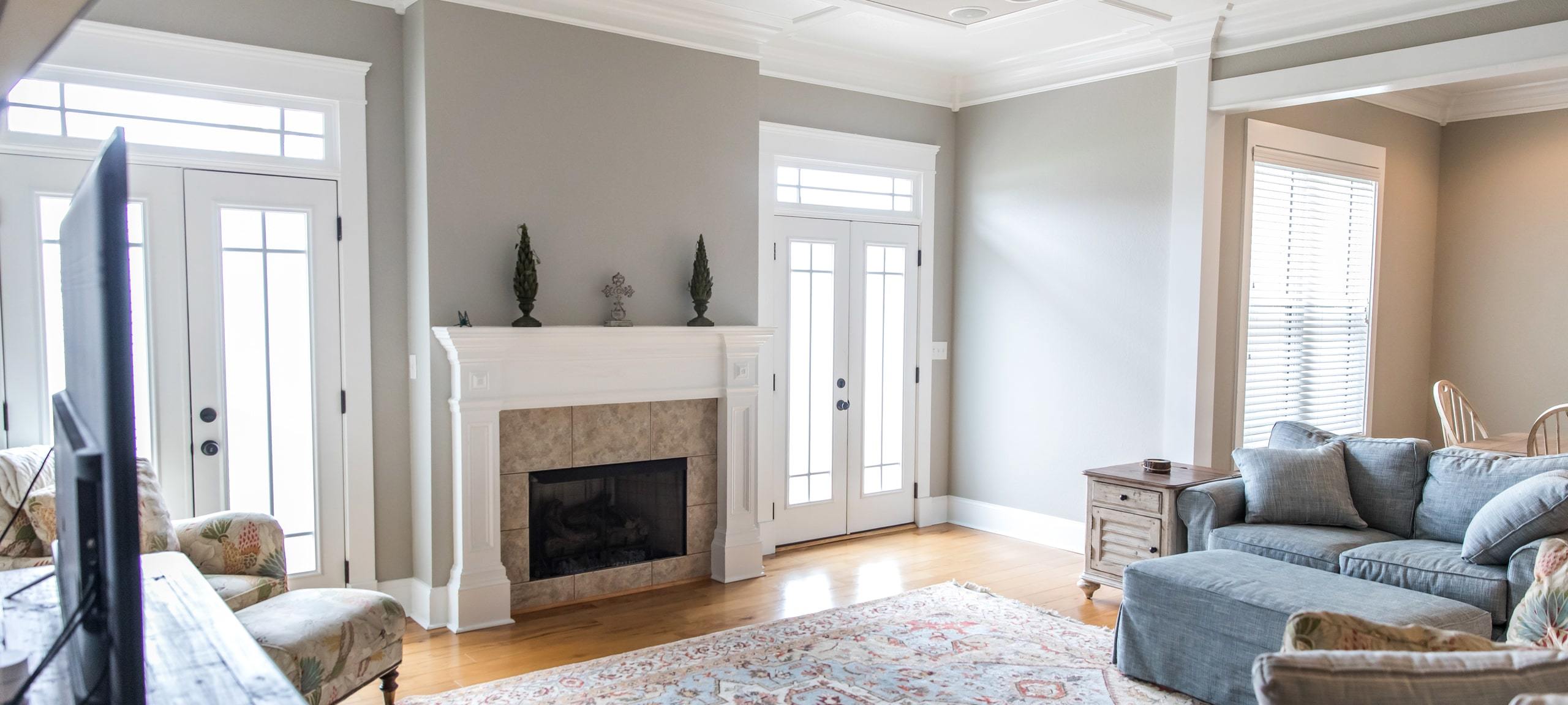 Living room with fireplace, typical of North End Decatur home